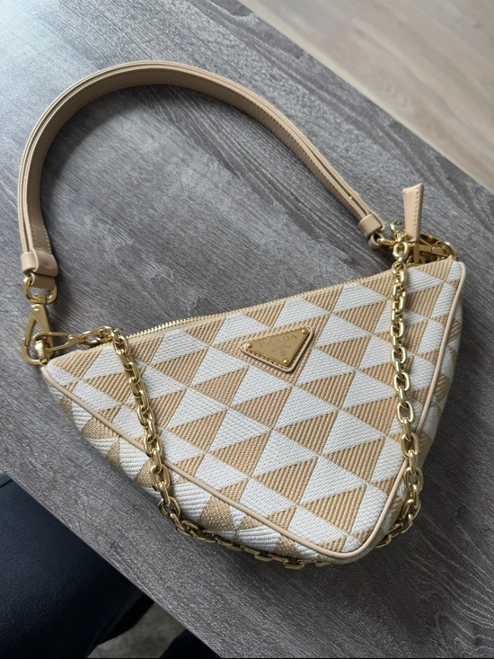 Prada Handbags - Prada Beige & White Triangle-Print Mini Shoulder Bag with Gold Chain